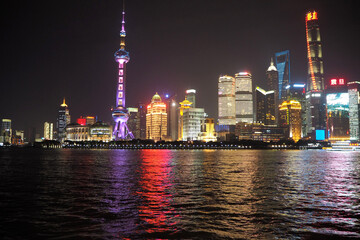 Obraz premium Shanghai Pudong Skyline Reflected in Huangpu River