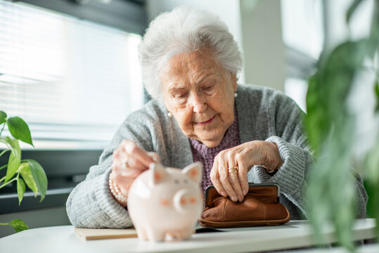 Senior woman planning finances and savings for retirement.