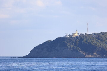 Lighthouse Cap Malabata.  The Lighthouse at Cap Malabata is a square-towered lighthouse built in 1919.  It is situated on a cliff at the eastern end of Tangier Bay, Morocco.