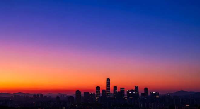 Seoul city skyline silhouette against a vibrant purple and orang