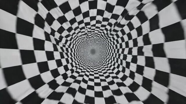 Black and white checkerboard tunnel with distorted perspective creating an optical illusion and a sense of movement