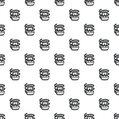 Tooth inside a spiral spring representing dental care and orthodontics in a seamless pattern