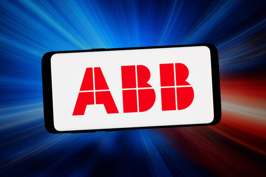 Stuttgart, Germany - 02-12-2026: In this photo illustration, the logo of Swiss technology company ABB Ltd. is displayed on a smartphone in front of abstract background on computer screen.