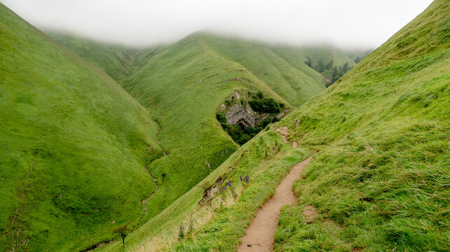 Arpea Cave nestled in lush green hills of Navarra