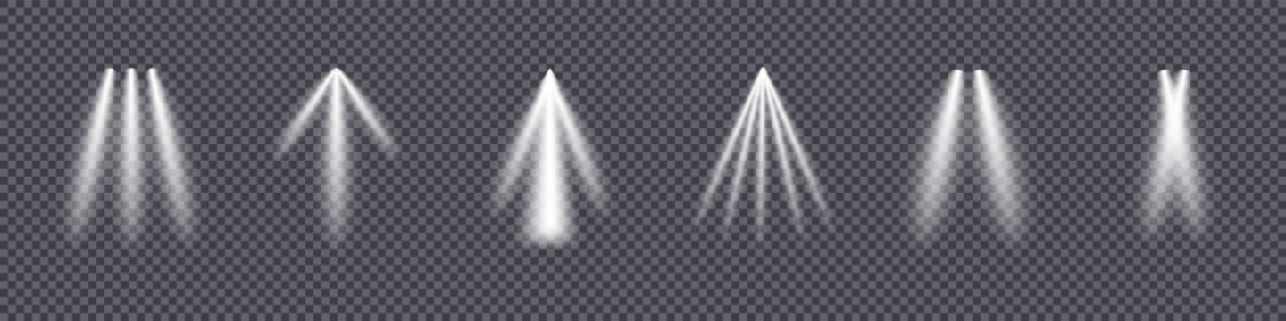 Transparent light beam effects set. White glowing spotlights isolated on checkered background. Realistic illumination elements for overlays