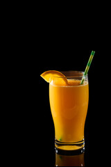Orange juice refreshing tropical drink with straw