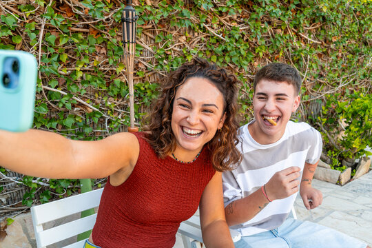 Friends capturing a moment of joy outdoors