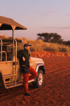 Traveler in african desert during sunset adventure