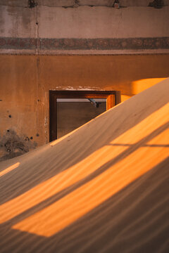 Abandoned house filled with desert sand in Luderitz