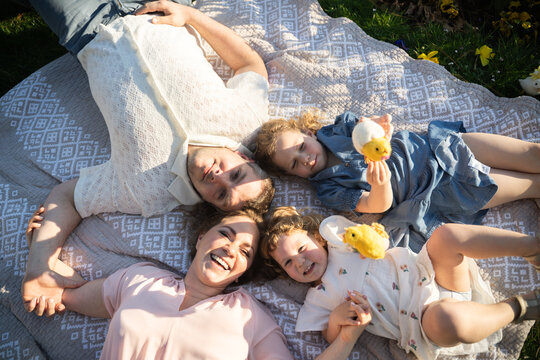 Family celebrating Easter together in springtime
