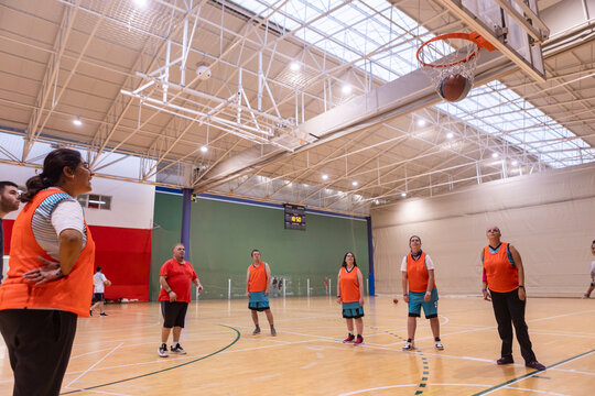 Men and Women with Disabilities Playing Inclusive Basketball