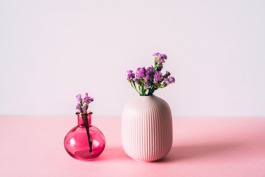 Minimalist floral arrangement with vases