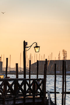 Venice sunset view of San Marco square with lamp post
