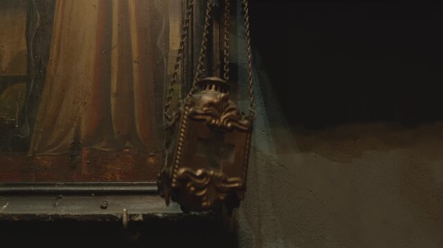 Historical interior illuminated by warm amber light and antique decor