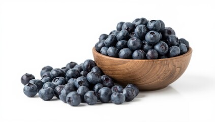 Wooden bowl with blueberries on white background