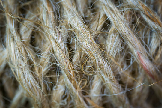jute twine texture background macro tangled rope surface natural beige organic fiber string pattern concept of agriculture, handicraft, shipping