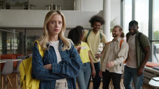 Caucasian woman ignoring bullying students bully girl in university college high school academy social problem trouble four multiethnic classmates laughing pointing on female socialization difficulty