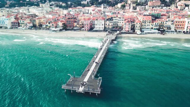 Drone panorama of Alassio beach and Ligurian coastline on sunny day