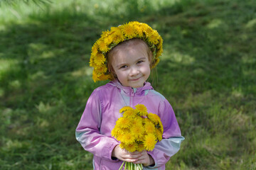 Girl with a crown of dandelions