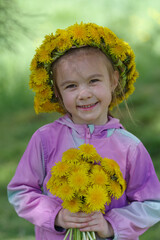 Girl with a crown of dandelions