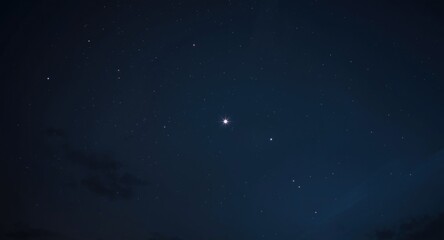 Fototapeta premium shining twin stars casting light across a dark night atmosphere