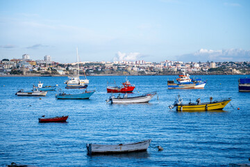 Cascais harbor fishing boats under blue evening sky