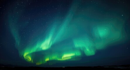 Fototapeta premium mesmeric green and white northern lights flashing across dark sky