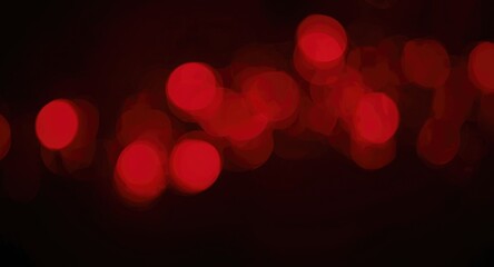Obraz premium Soft red bokeh lights adding festive charm to a dark background