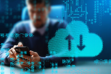 Man using smartphone to access cloud storage for data transfer at office