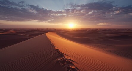 Peaceful dusk scene over endless sand dunes with rich warm light