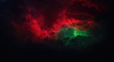 Fototapeta premium Red and green luminous display lighting the dark cloudy sky with bright colors