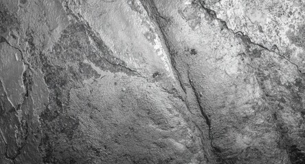 Monochrome abstract rough texture background featuring bold black and white layering and copy space