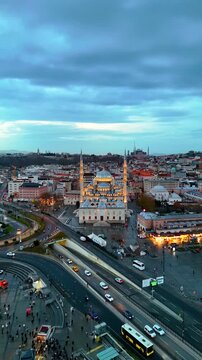 Aerial View of the Historical New Mosque (Yeni Camii) and Emin&ouml;n&uuml; Square at Sunset, Istanbul, Turkey