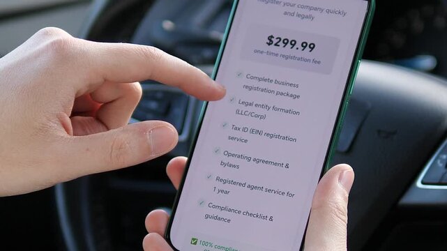 Hands navigate business registration app with pricing and legal entity setup details on mobile screen. Seamless online incorporation and compliance service. Perfect for startup marketing, corporate
