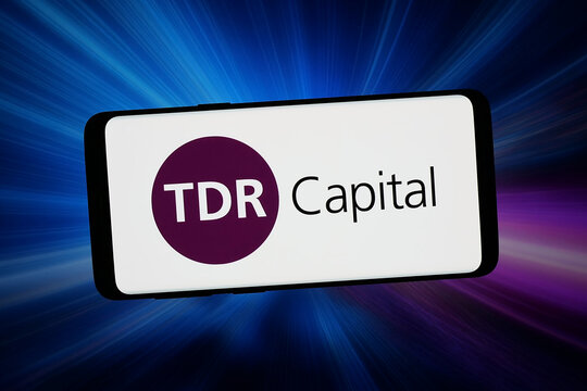 Stuttgart, Germany - 02-13-2026: In this photo illustration, the logo of private equity company TDR Capital LLP is displayed on a smartphone in front of abstract background on computer screen.