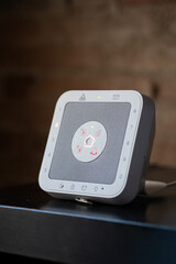 Smart home security system keypad with touch control panel displaying warning and alarm icons, ensuring protection, safety, and surveillance for modern lifestyles