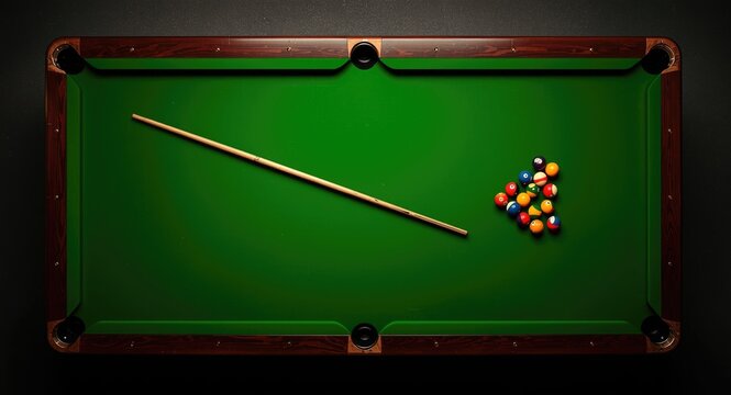 Green felt pool snooker table with wooden cue and assorted colorful balls seen from top down