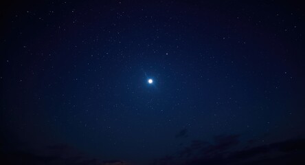 Naklejka premium a peaceful night sky with a bright full moon and a scattering of shining stars