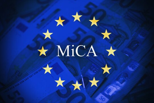 Conceptual stock image representing MICA in finance and investment, showing euro banknotes layered on a flag background. Perfect for topics including banking regulations, investment strategy,