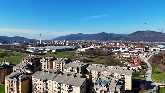 Drone footage of Trstenik cityscape, factories and nature landscape in Serbia