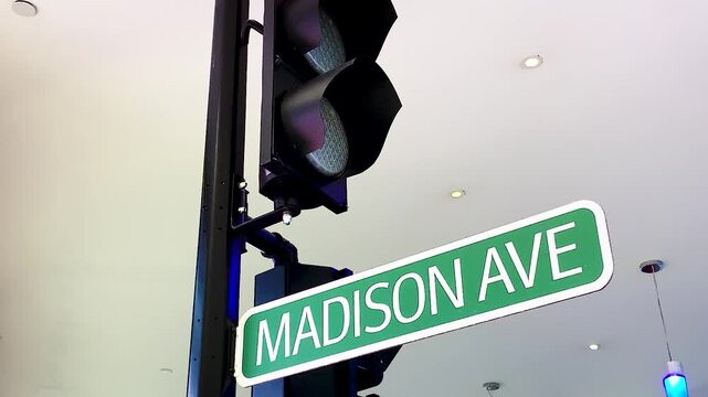 Madison ave New York City road sign and traffic lights landmark. traveling USA Walk