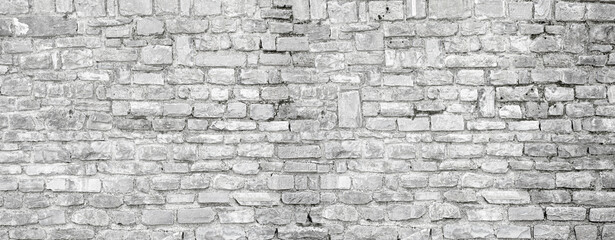 Obraz premium Gray rough stone wall textured background surface
