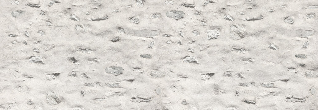 White stone wall texture background with plaster