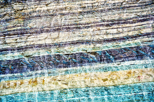 Sedimentary rock layers showing colorful geological formation