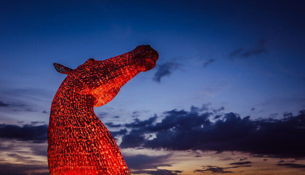 View of the the Kelpies in July 19 2016 in Helix park, Falkirk, Scotland. Designed by Scottish sculptor Andy Scott, and they're the largest pair of equine sculptures in the world.