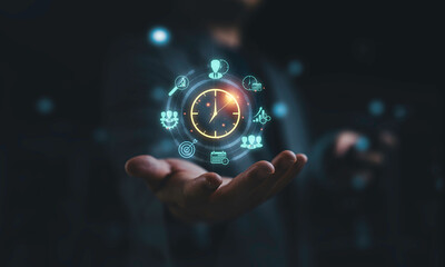 Businessman holding virtual clock with digital business icons represent time management, productivity planning and workflow optimization. Corporate performance strategy and smart scheduling concept.