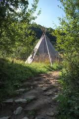 Gray Wigwam on Summer Meadow in the Carpathians