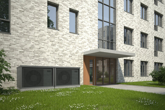 W&auml;rmepumpen vor einem Mehrfamilienhaus