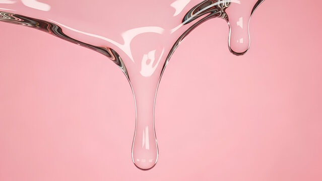 Pink liquid droplets on pink background