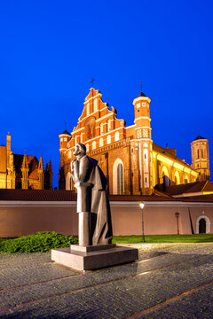 A Statue of the Polish Poet Adam Mickiewicz in front of St. Anne's Church and the Church of St. Francis and St. Bernard, Vilnius, Lithuania